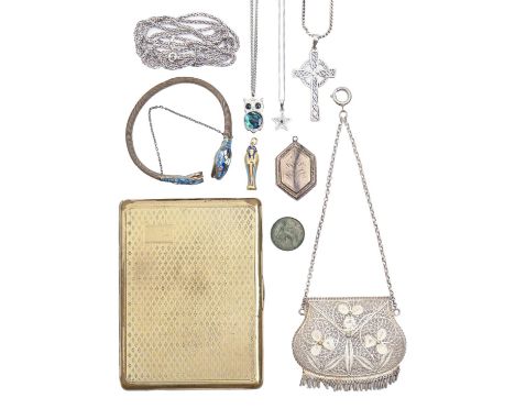 A silver filigree purse, early 20th c, with chain handle, 65mm l, a continental silver gilt and enamel ancient Egyptian sarco