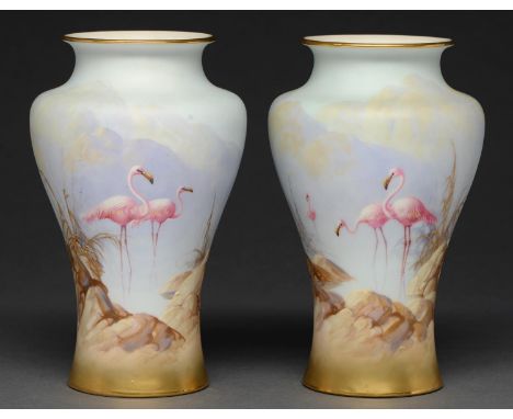 A pair of Royal Worcester vases, 1912 and 1914, painted by W Powell, both signed, with flamingos in a continuous landscape, 2