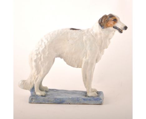 Stella R Crofts, 'Brecqhou Turgenoff' a pottery study of a Borzoi, circa 1930, incised signature and title to underside of ba