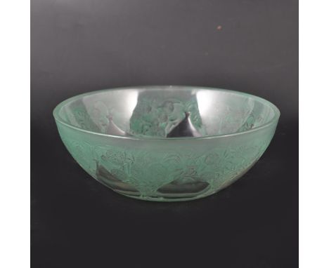 A René Lalique glass bowl, 'Vases' design, introduced 1921, heightened with green staining, moulded mark and stencilled 'R. L