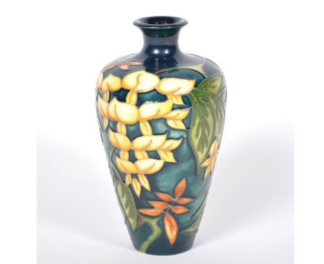 A Moorcroft Pottery vase, 'Wisteria' designed by Philip Gibson for MCC, numbered 603, 15.5cm.