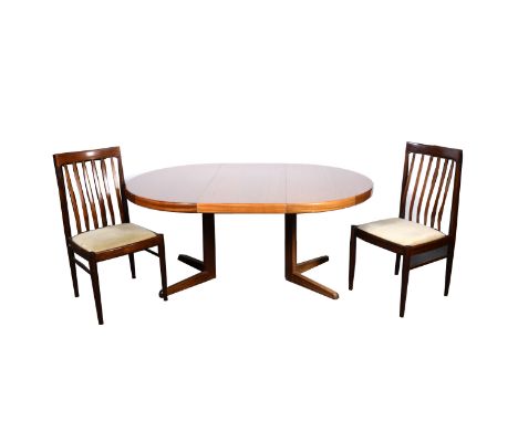 A Danish teak dining room suite by Bramin Møbler, comprising extending table and two leaves, extended length 215cm, width 115