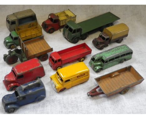 DINKY TOYS: A BEDFORD KODAK VAN, a Foden flat bed lorry, a Dodge cattle truck and others similar (13) in play-worn condition