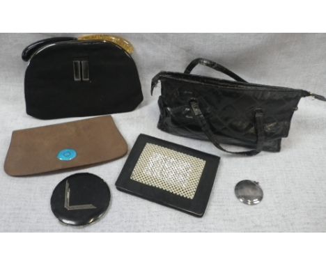A VINTAGE VANITY SET contained in a black mock leather bag, three vintage evening purses, a 1920's style black compact and an