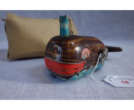 A VINTAGE JAPANESE TINPLATE CLOCKWORK WHALE "Billy the Ball Blowing Magic Whale" in working order with part box