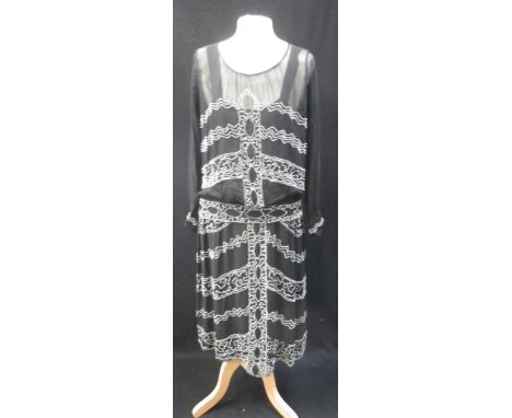 A 1930'S STYLE BLACK CHIFFON CALF LENGTH SHIFT DRESS decorated with clear bugle beads