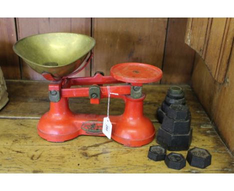A Thornton and Co. 'The Viking', Wolverhampton, shop scales with brass bowl and red painted body with weights