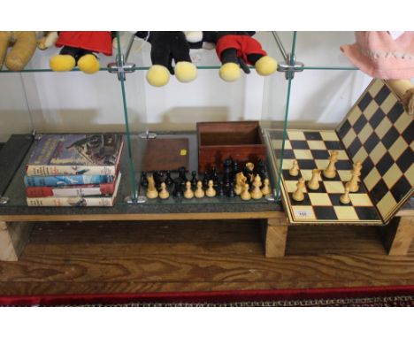 A vintage chess set and board, a selection of six Enid Blyton Famous Five hardback adventure books, one old doll, etc