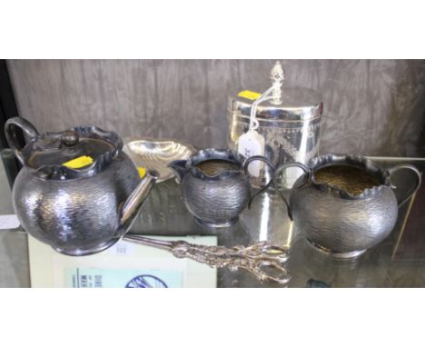 A silver plated three-piece bachelor tea set with hammered finish by John Cockburn, silversmith, together with a silver plate