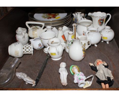 A selection of early 20th century ceramic miniature souvenirs and a set of six circular desert plates