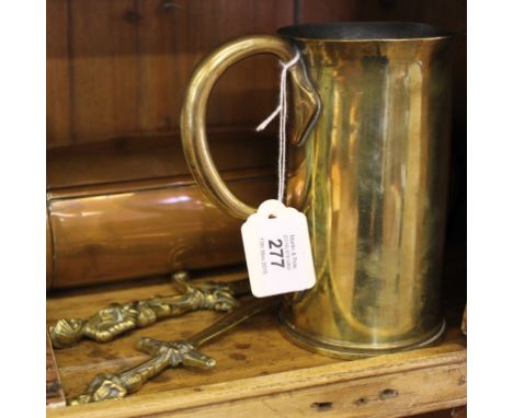 A Victorian cylindrical shape copper flask, a brass beaker and two brass letter openers (3)