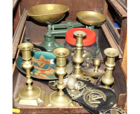 A selection of old household brassware, to include weighing scales, candles sticks, horse brasses, etc