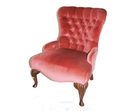 A Victorian-style fabric upholstered lady's chair with button back support, serpentine fronted seat, raised on cabriole legs 