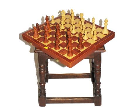 A Kasperov chess board with full set of chess pieces