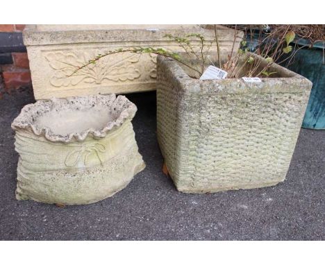 A cast square formed planter of woven basket design, together with a novelty planter in the form of a sack