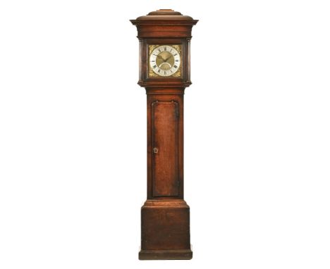 A late 18th century oak longcase clock, with semi pagoda square pillar hood containing brass dial with spandrel decoration, n