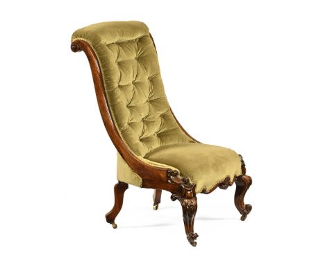A Victorian rosewood framed scroll salon chair, with sweep sides terminating in knurl legs with 20th century button back gree