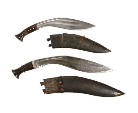 A late 19th/early 20th century Kukri knife, with leather and silver coloured metal mounted scabbard, and another similar but 