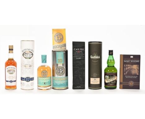 A collection of whisky, comprising of Bruichladdich Islay single malt 10 year old Scotch whisky with tube, Bowmore Islay sing