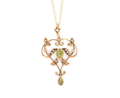 A Victorian 9 ct gold peridot and seed pearl set pendant, the chain stamped 9 k, gross weight 2.5 grams.