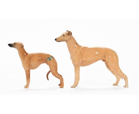 A Beswick model of a greyhound "CH Jovial Roger" to the base, together with a smaller Beswick greyhound model (2).