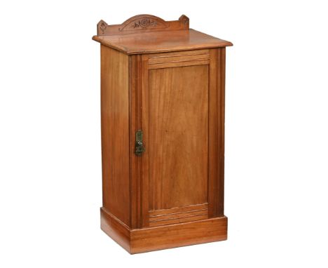 A late Victorian bleached mahogany pot cupboard/bedside cabinet, with crest rail back and door under on plinth base.  Height 