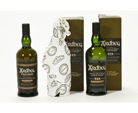 A collection of three Ardbeg malt Scotch whisky, Ardbeg Uigeadail The Ultimate single Islay malt Scotch whisky traditional st