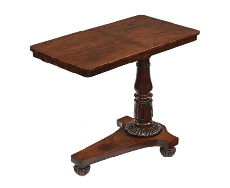 A Regency/William IV mahogany bed table, of typical form with adjustable reading shelf and height with turned and carved colu