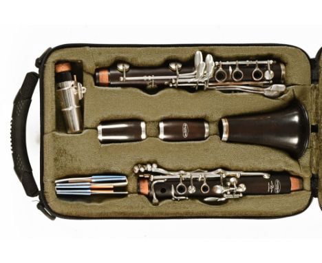 A cased clarinet by Hampson, with a mouthpiece by Buffet Crampon of Paris France, all in a fitted case.