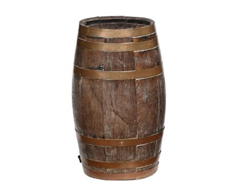 A Traditional brass bound oak barrel stick stand.  Width 28 cm.