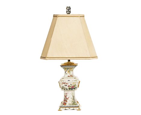 A decorative porcelain table lamp with shade, overall height 64 cm.