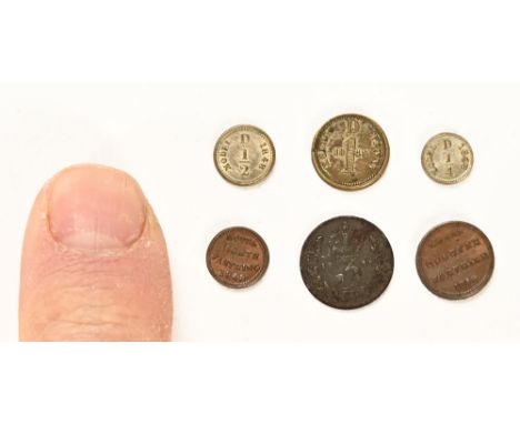 Six pieces of Victorian model money, in small cylindrical lidded vessel.  Height 17 mm, diameter 21 mm.