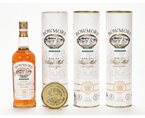 A collection of three bottles of Bowmore Legend Islay single malt Scotch whisky (see illustration). *