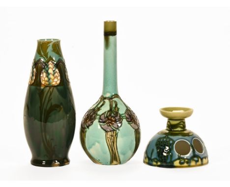 Minton Secessionist wares, a chamber candlestick marked to base No 1, a spill vase with Minton mark to the base No. 68, and a