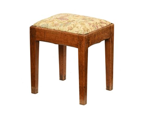 An early to mid 20th century golden oak stool, in the Simpson Arts & Crafts stye with later tapestry upholstered top over rec