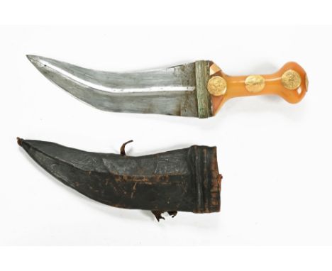 A Yemeni Jambiya, the curving blade with a raised central ridge with leather bound scabbard.  34 cm long.  This bladed produc