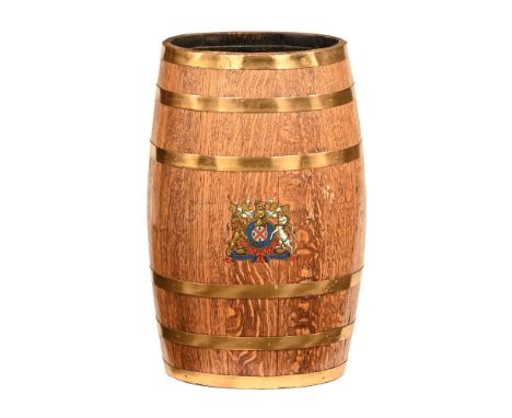 A 19th century barrel form stick stand, with brass bindings and armorial.  Height 61 cm, top dimensions 33 cm x 25 cm.
