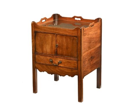A Georgian mahogany tray top commode, converted to a cupboard and drawer and raised on moulded legs.  Height 77 cm, width 56.