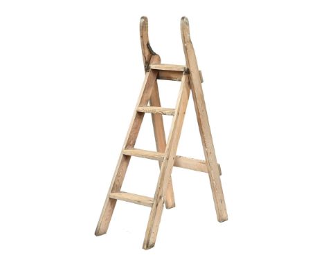 A set of vintage bleached pine step ladders, of traditional design with release catch.  Height 126 cm, width 35 cm (decorativ