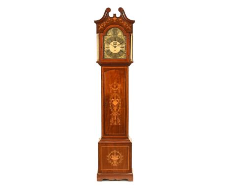 An Edwardian inlaid mahogany musical longcase clock, with three train movement striking on eight bells and five gongs, inlaid
