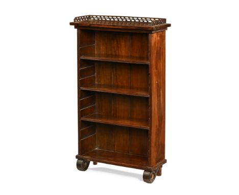 A Regency Anglo Chinese hardwood small open bookcase, with adjustable shelves and scroll feet.  Height including upstand 100 
