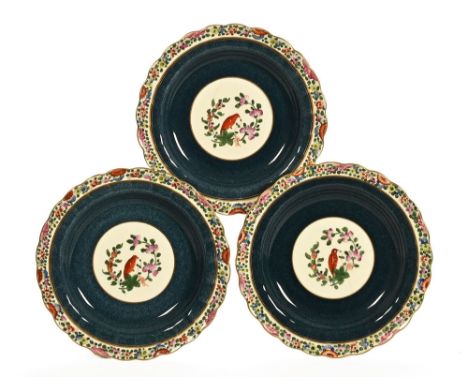 Three Royal Worcester "Old Worcester Parrot" decorative shallow dishes.  Diameter 21 cm.
