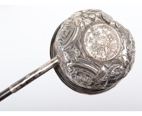 A William &amp; Mary silver shilling coin set punch ladle, coin dated 1692, with twist handle, 32cm