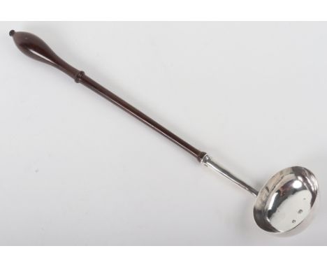 A George II silver toddy ladle, John Fossey, London 1733, turned wood handle, 37cm 88g