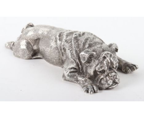 A heavy silver model of a recumbent pug dog, London 1976, 17cm 1890g