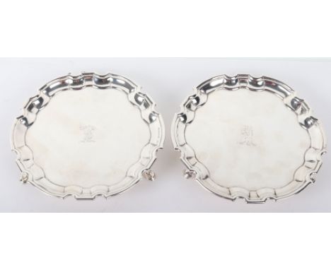 A pair of George II silver salvers, John Tuite, 1731/3, typical form, raised on horseshoe feet, 15cmDiam 438g