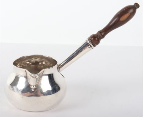 A George II silver brandy saucepan, London 1727, turned wood handle, 19cm 86g