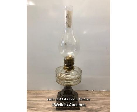 *OIL LAMP WITH GLASS RESERVOIR, CAST IRON BASE, YOUNGS BRILLIANT