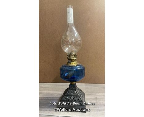 *CAST IRON OIL LAMP WITH BLUE GLASS RESERVOIR