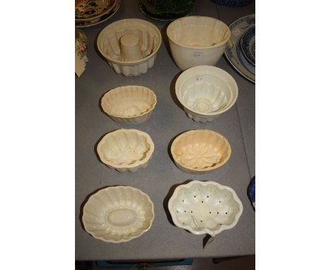A collection of eight ceramic food moulds, various, five with Maling or Seaton ware marks.